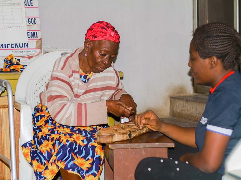Senior Care Outreach - Healthcare professionals providing home care for elderly patients
